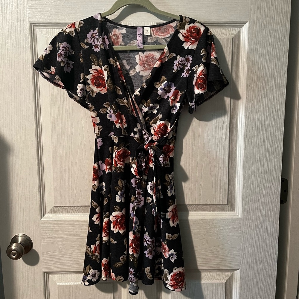 Francesca’s floral shortsleeved wrap dress.